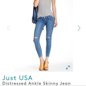 Distressed skinny low rise jeans